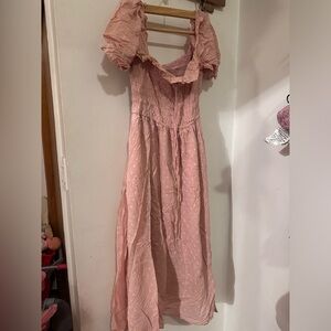 Women closet clean out pink dress